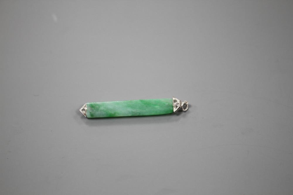 A 1920s style white metal mounted, jade and diamond pendant, overall 38mm, gross weight 1.7 grams.